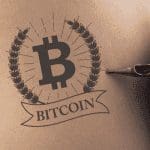 Bitcoin, dogecoin en NFT tatoeages steeds populairder, groei van 222%